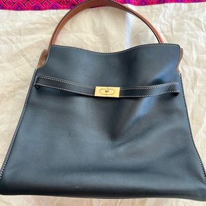 Tory Burch leather black bag. Slight discoloration spot on back